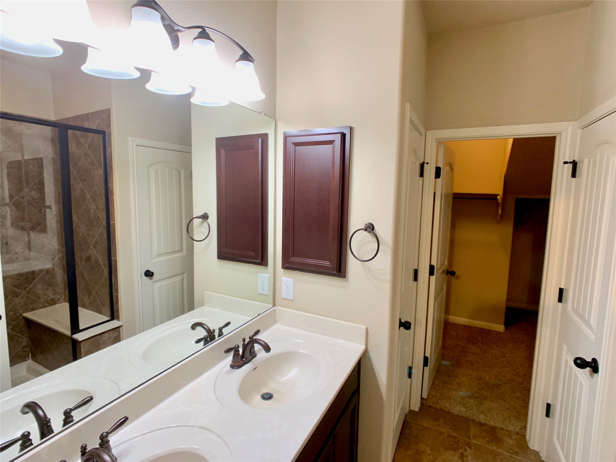 14001 Avery Ranch Boulevard, Unit 1204 Austin, TX 78717 - Photo 14 of 18 a bathroom with a sink and a mirror