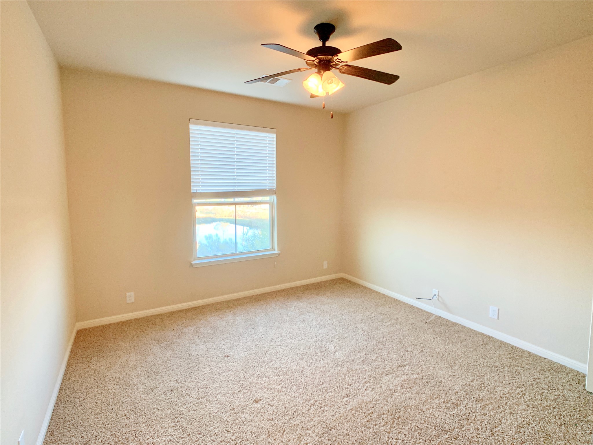 14001 Avery Ranch Boulevard, Unit 1204 Austin, TX 78717 - Photo 18 of 18 a view of an empty room with a window