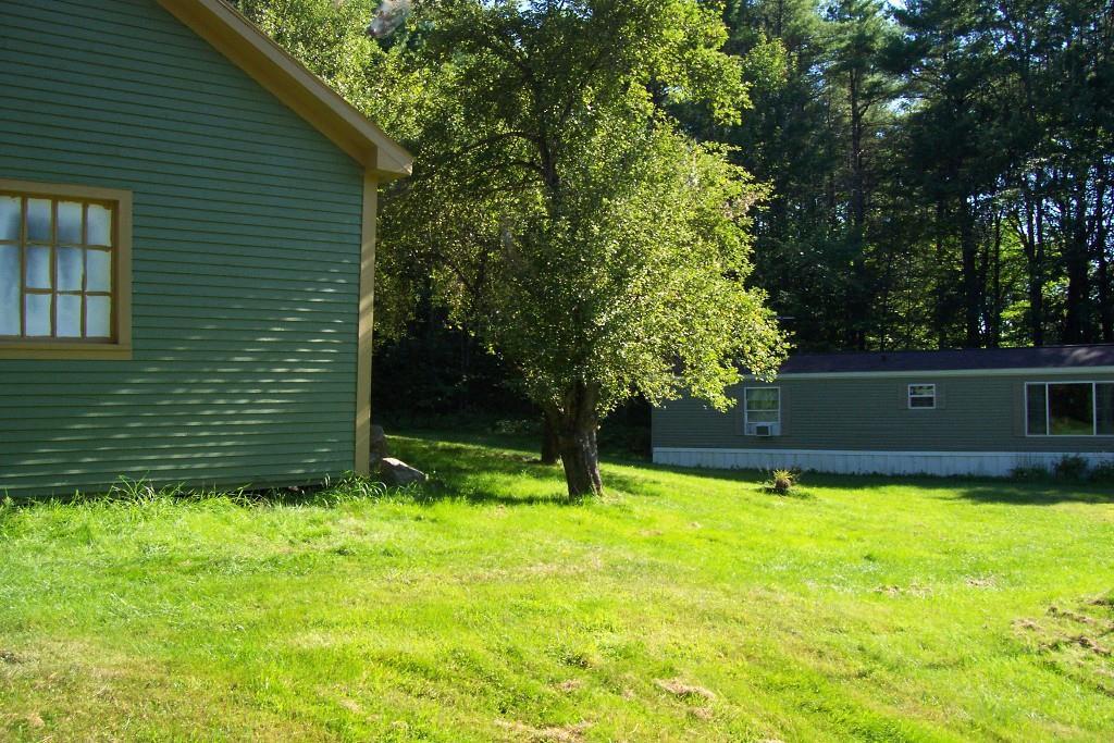 61 Gore Road Naples, ME 04055 - Photo 9 of 33 The shed and the the crab apple tree