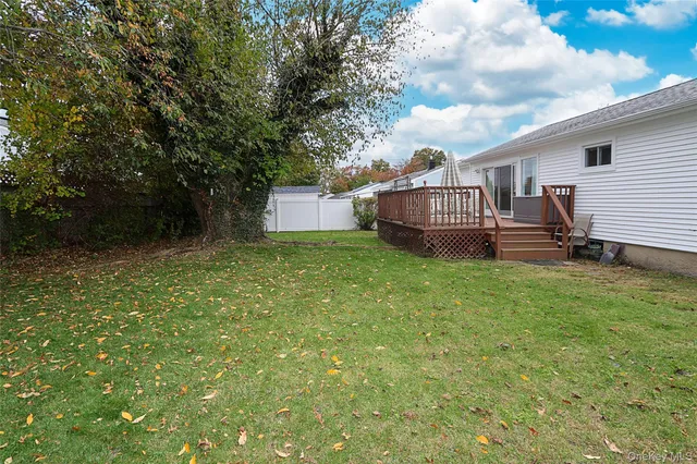 a view of a house with a back yard