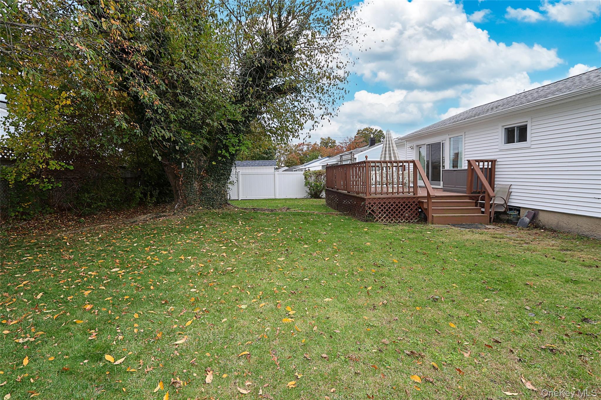 6 Gerhard Road Plainview, NY 11803 - Photo 23 of 29 a view of a house with a back yard