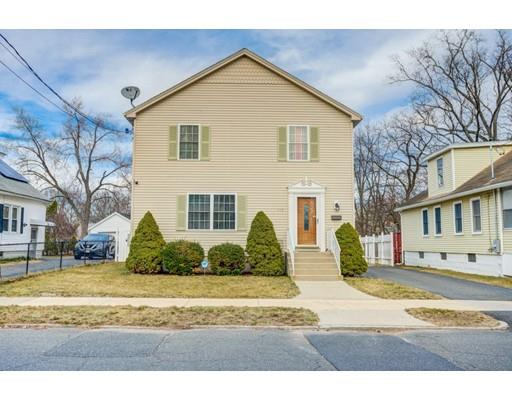115 Eddy Street Springfield, MA 01104 - Photo 1 of 28 a view of a house with a yard