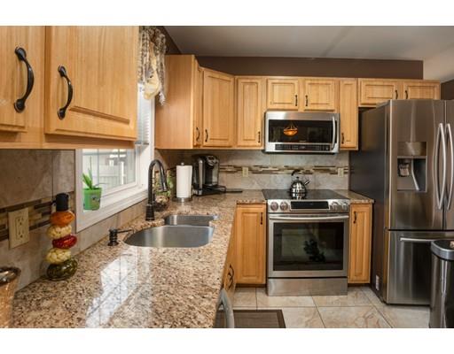 115 Eddy Street Springfield, MA 01104 - Photo 10 of 28 a kitchen with a refrigerator stove and microwave