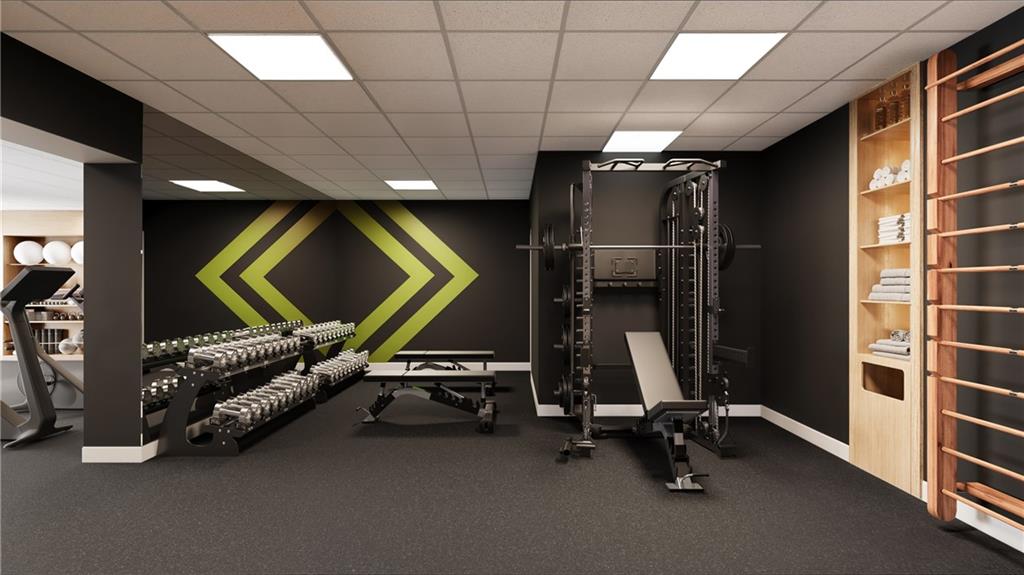 2460 Peachtree Road Northwest, Unit 304 Atlanta, GA 30305 - Photo 12 of 15 a view of a room with gym equipment
