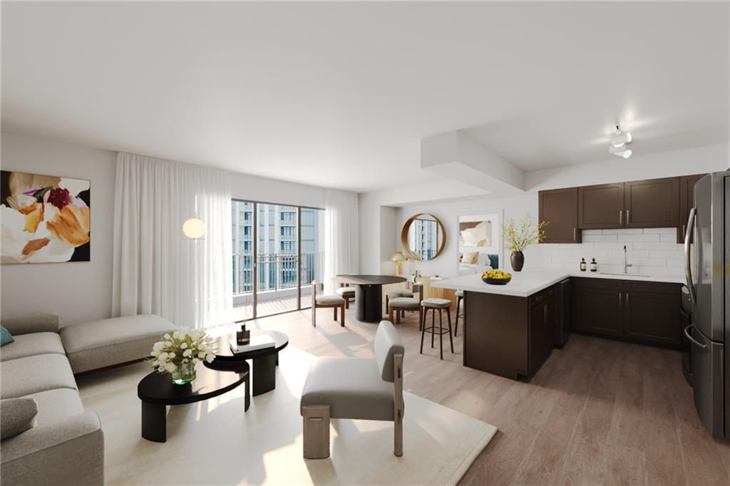 2460 Peachtree Road Northwest, Unit 304 Atlanta, GA 30305 - Photo 2 of 15 a living room with furniture kitchen area and a wooden floor