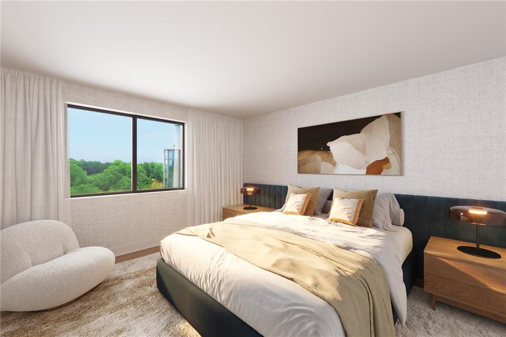 2460 Peachtree Road Northwest, Unit 304 Atlanta, GA 30305 - Photo 5 of 15 a bedroom with a bed and a large window