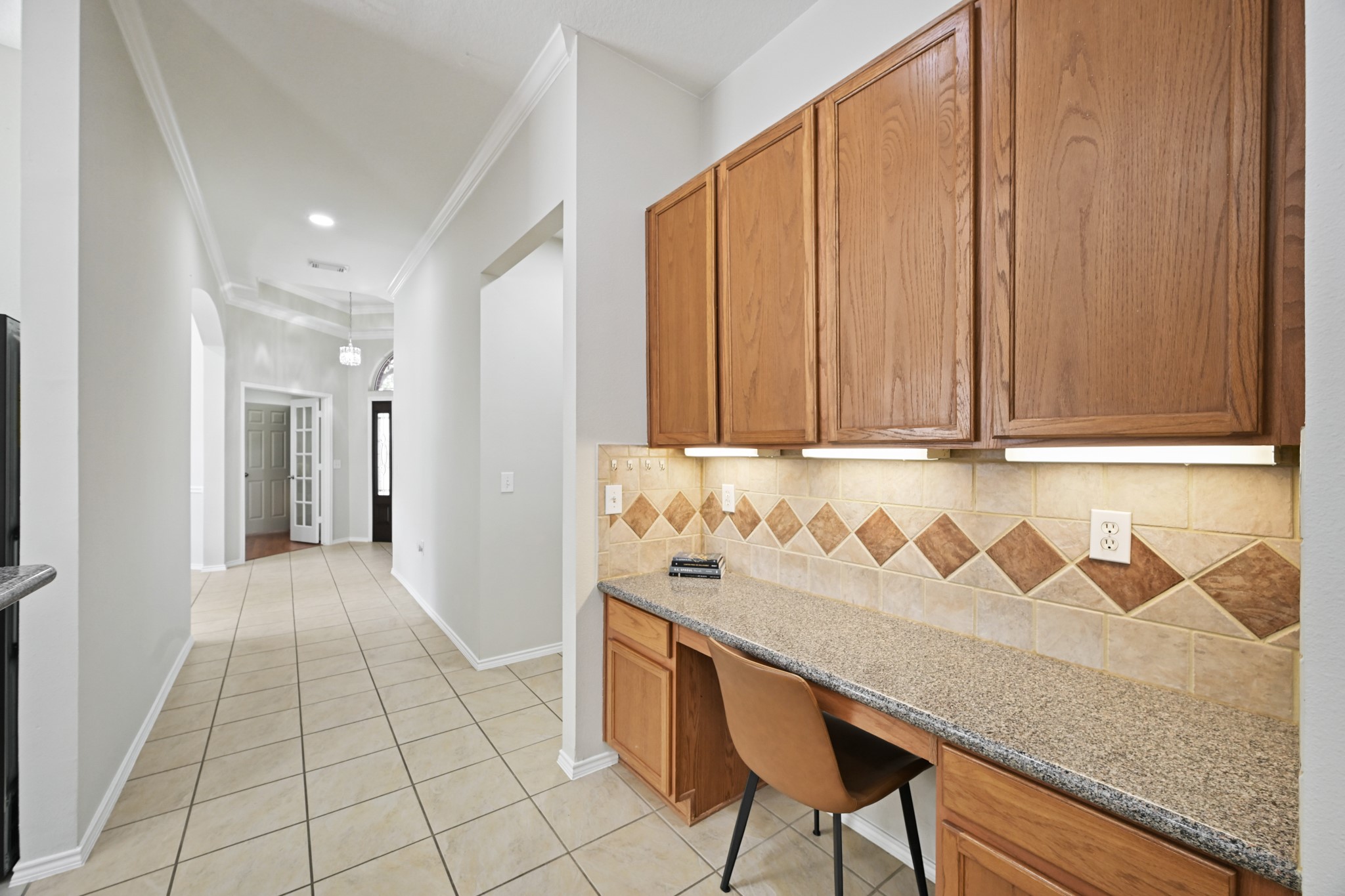 17314 Megan Springs Drive Spring, TX 77379 - Photo 10 of 40 Built-in desk/workspace conveniently located off the main living area