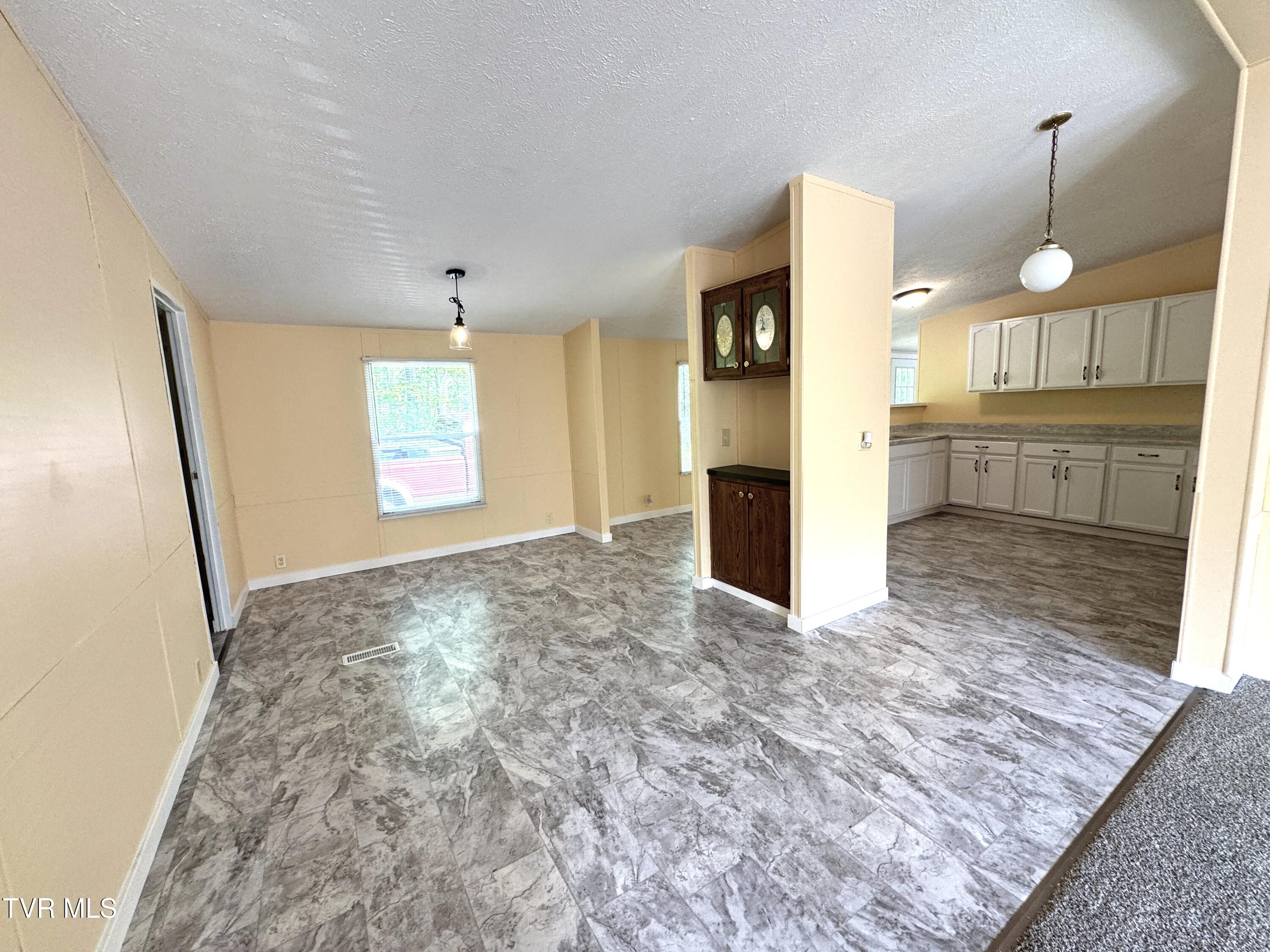 1555 Hamner Hollow Road Big Stone Gap, VA 24219 - Photo 20 of 41 DINING ROOM AND KITCHEN