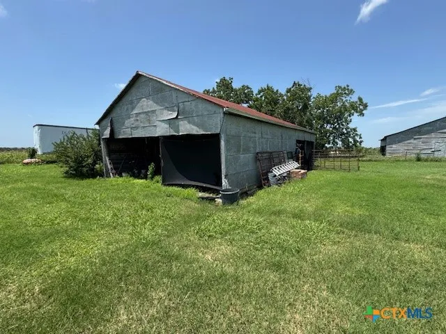 a view of backyard with green space