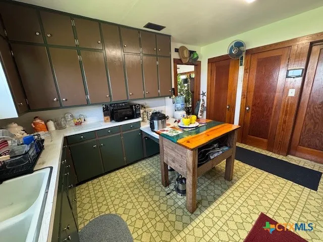 a room with furniture and window