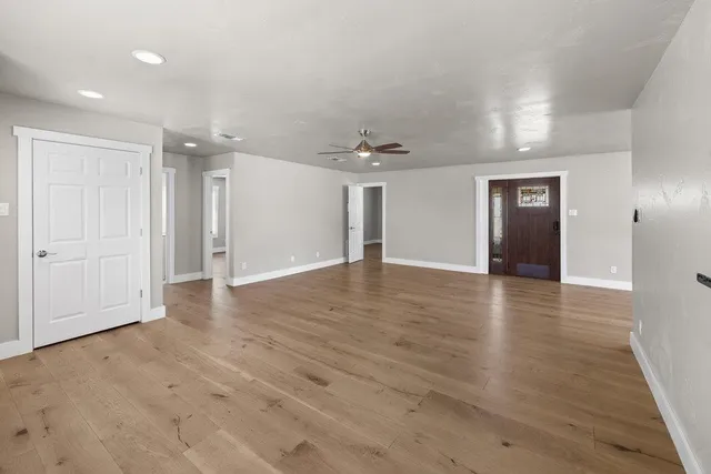 a view of a livingroom with wooden floor