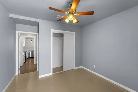 a view of a backyard of the house