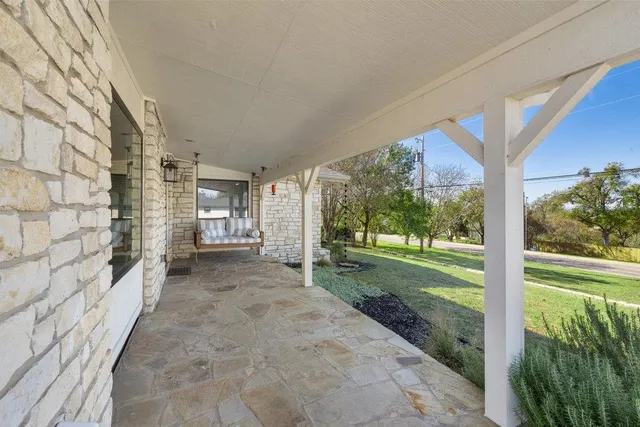 a view of a porch with a yard