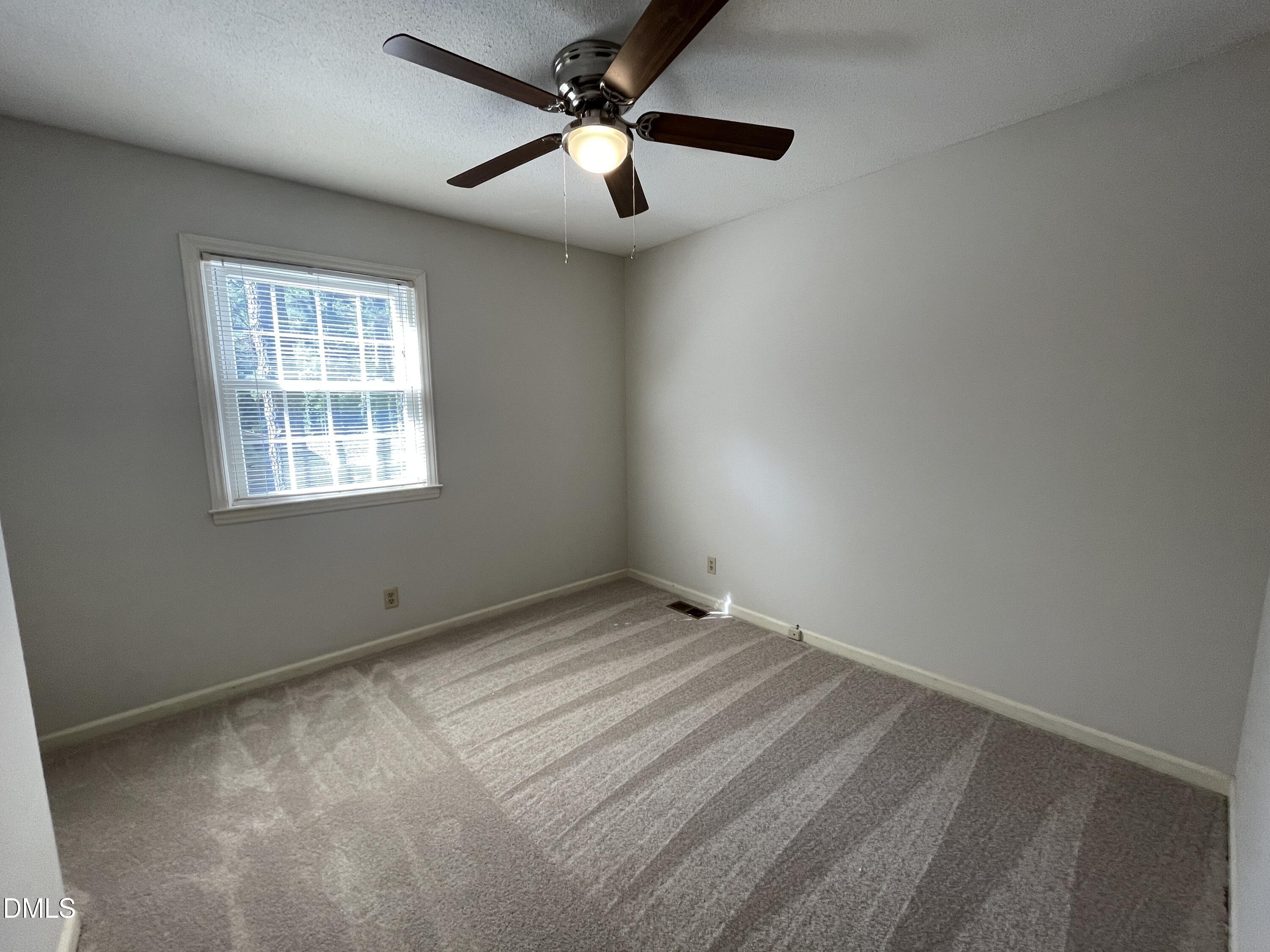 314 Brandywine Road Chapel Hill, NC 27516 - Photo 9 of 17 a view of an empty room and a window