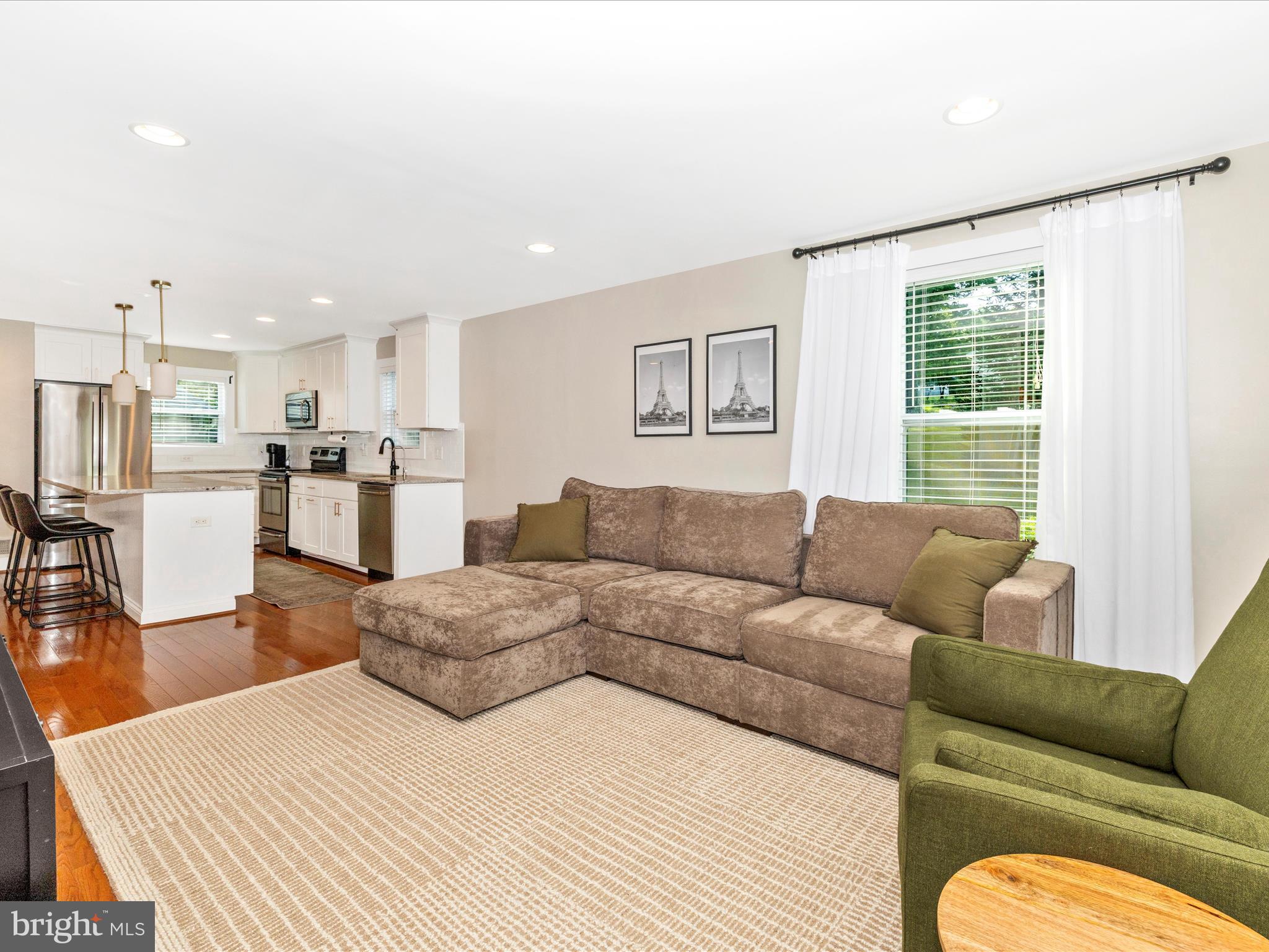 4533 Mountville Road Frederick, MD 21703 - Photo 15 of 70 a large bedroom with a bed couch and a window