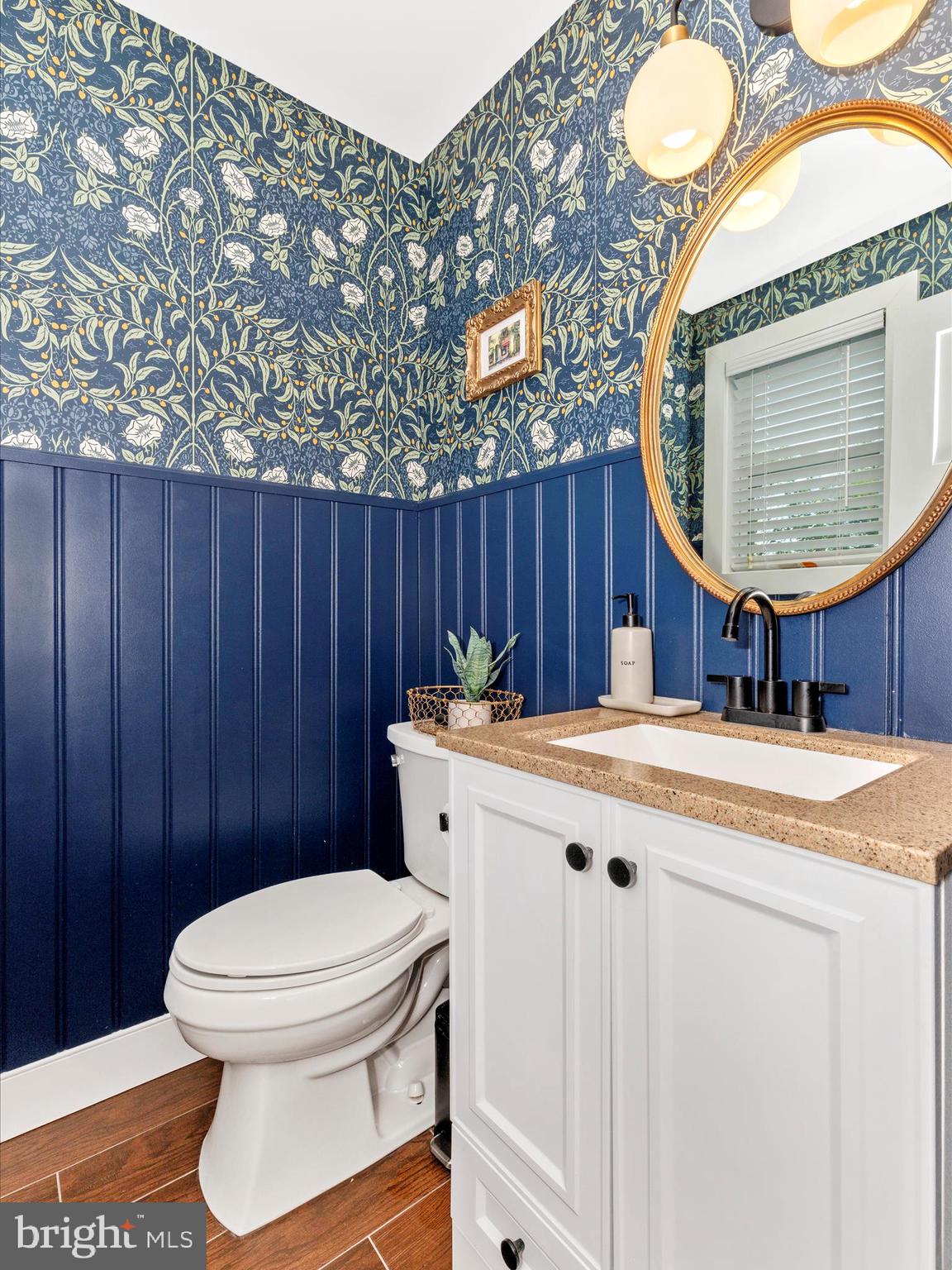 4533 Mountville Road Frederick, MD 21703 - Photo 25 of 70 a bathroom with a sink a toilet and a mirror