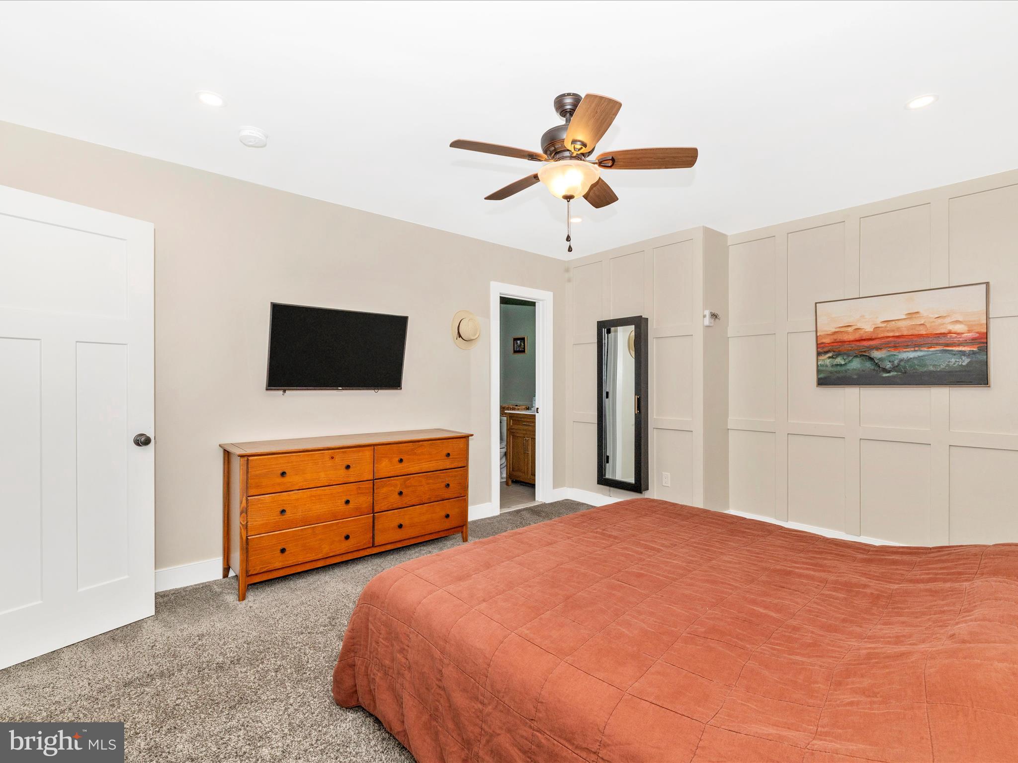 4533 Mountville Road Frederick, MD 21703 - Photo 27 of 70 a bedroom with a bed and a flat screen tv