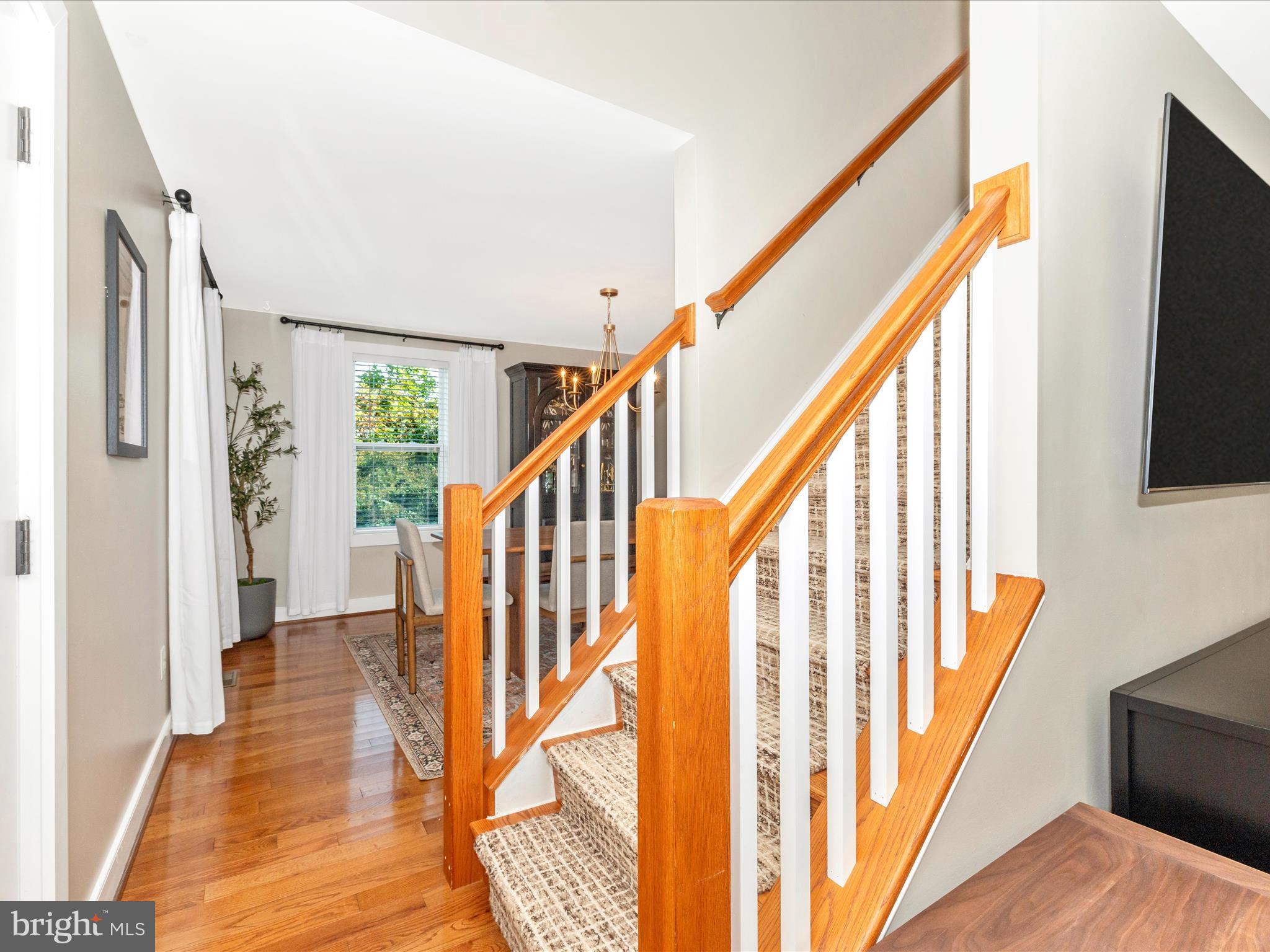 4533 Mountville Road Frederick, MD 21703 - Photo 4 of 70 a view of an entryway with wooden floor and stairs