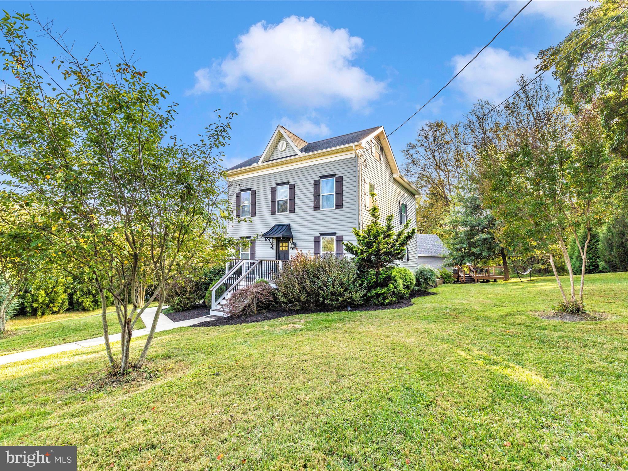4533 Mountville Road Frederick, MD 21703 - Photo 46 of 70 a view of a house with a backyard and a tree