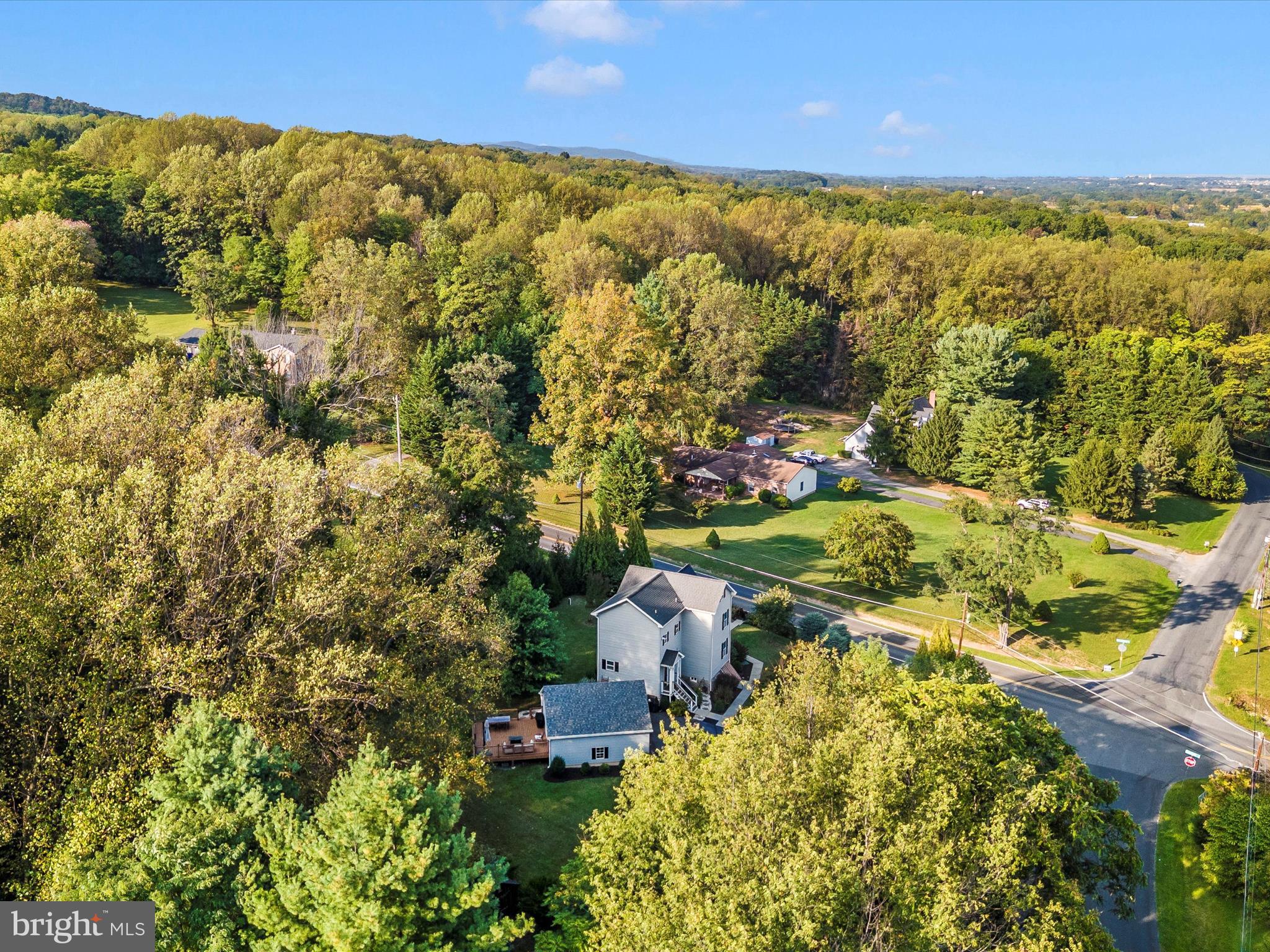 4533 Mountville Road Frederick, MD 21703 - Photo 60 of 70 an aerial view of residential houses with outdoor space and trees