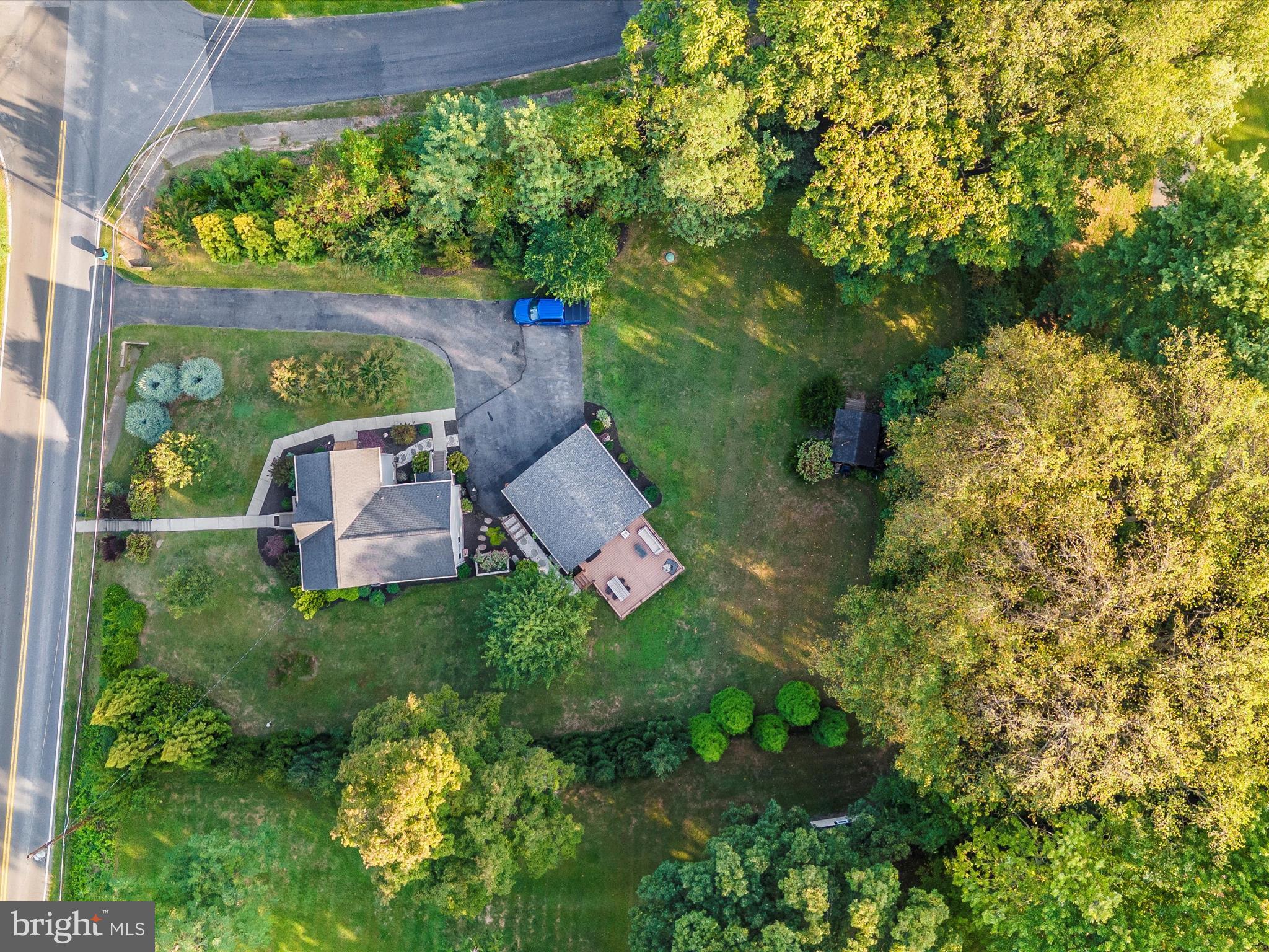 4533 Mountville Road Frederick, MD 21703 - Photo 63 of 70 a backyard of a house with lots of green space and garden