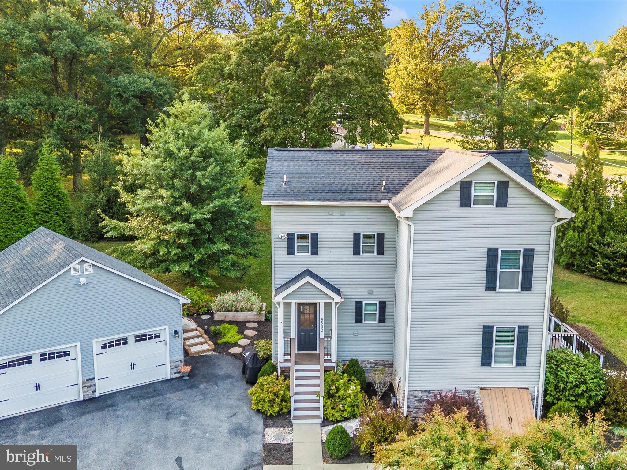 4533 Mountville Road Frederick, MD 21703 - Photo 67 of 70 a front view of a house with garden