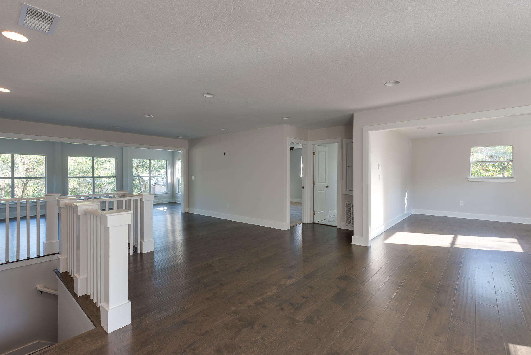 80 My Way Santa Rosa Beach, FL 32459 - Photo 14 of 33 a view of an empty room with wooden floor and a window