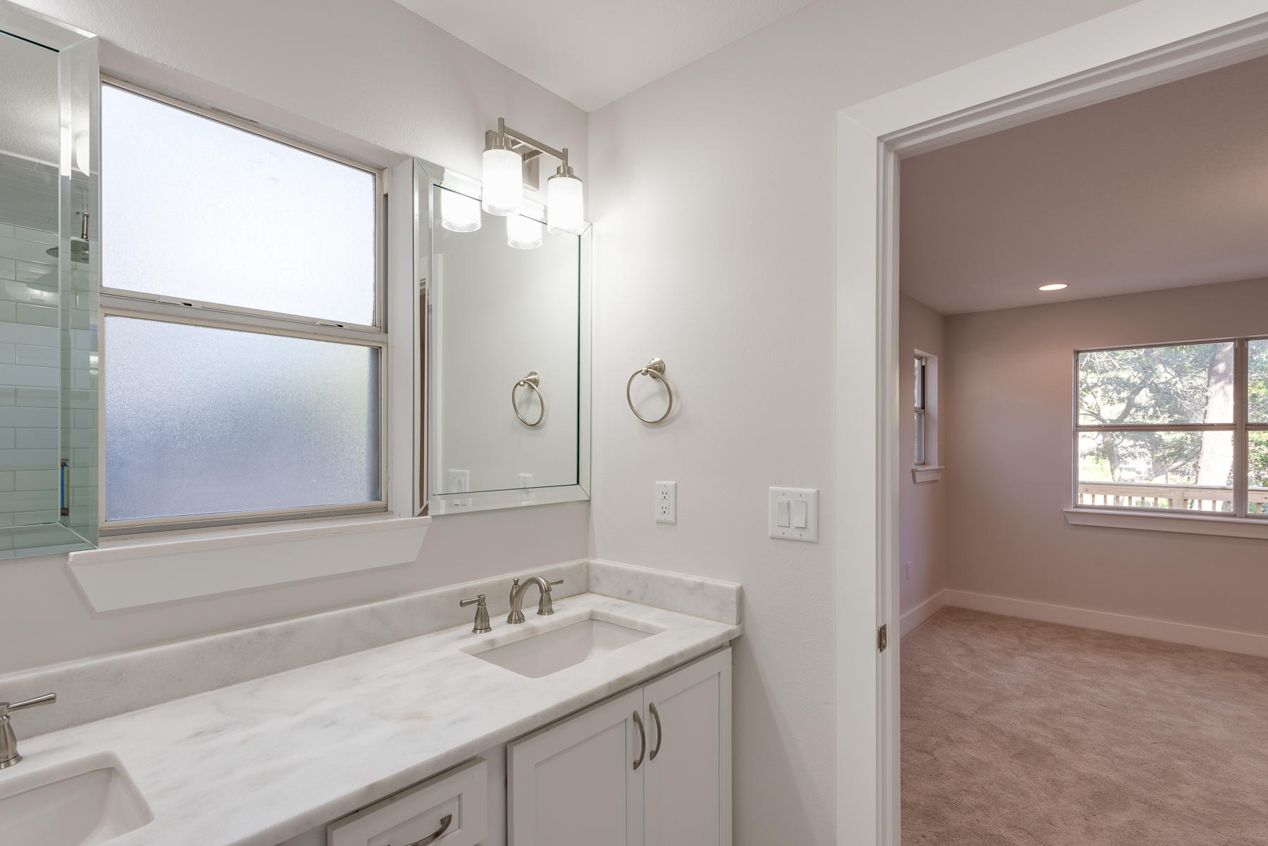 80 My Way Santa Rosa Beach, FL 32459 - Photo 22 of 33 a bathroom with a sink a vanity and a mirror