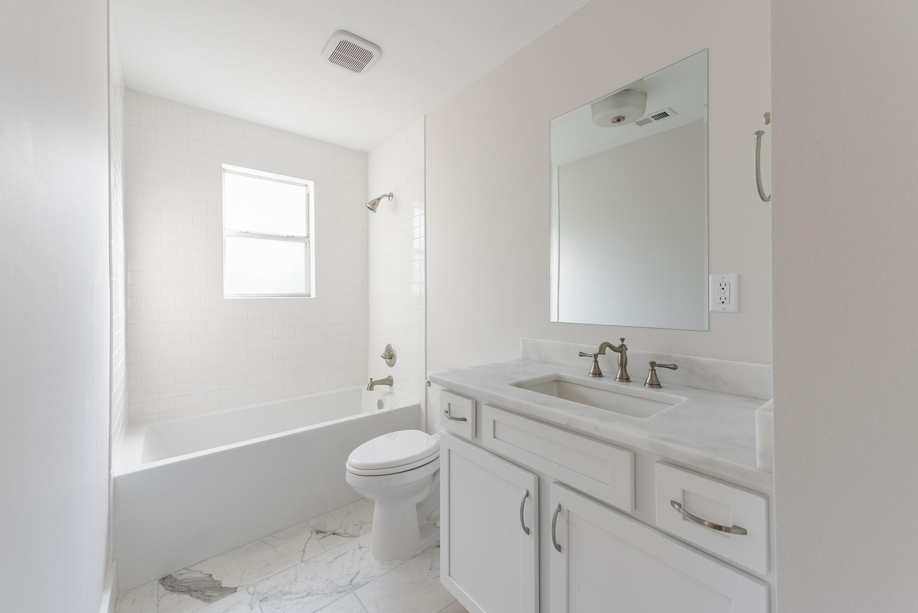 80 My Way Santa Rosa Beach, FL 32459 - Photo 28 of 33 a bathroom with a granite countertop toilet a sink and a bathtub