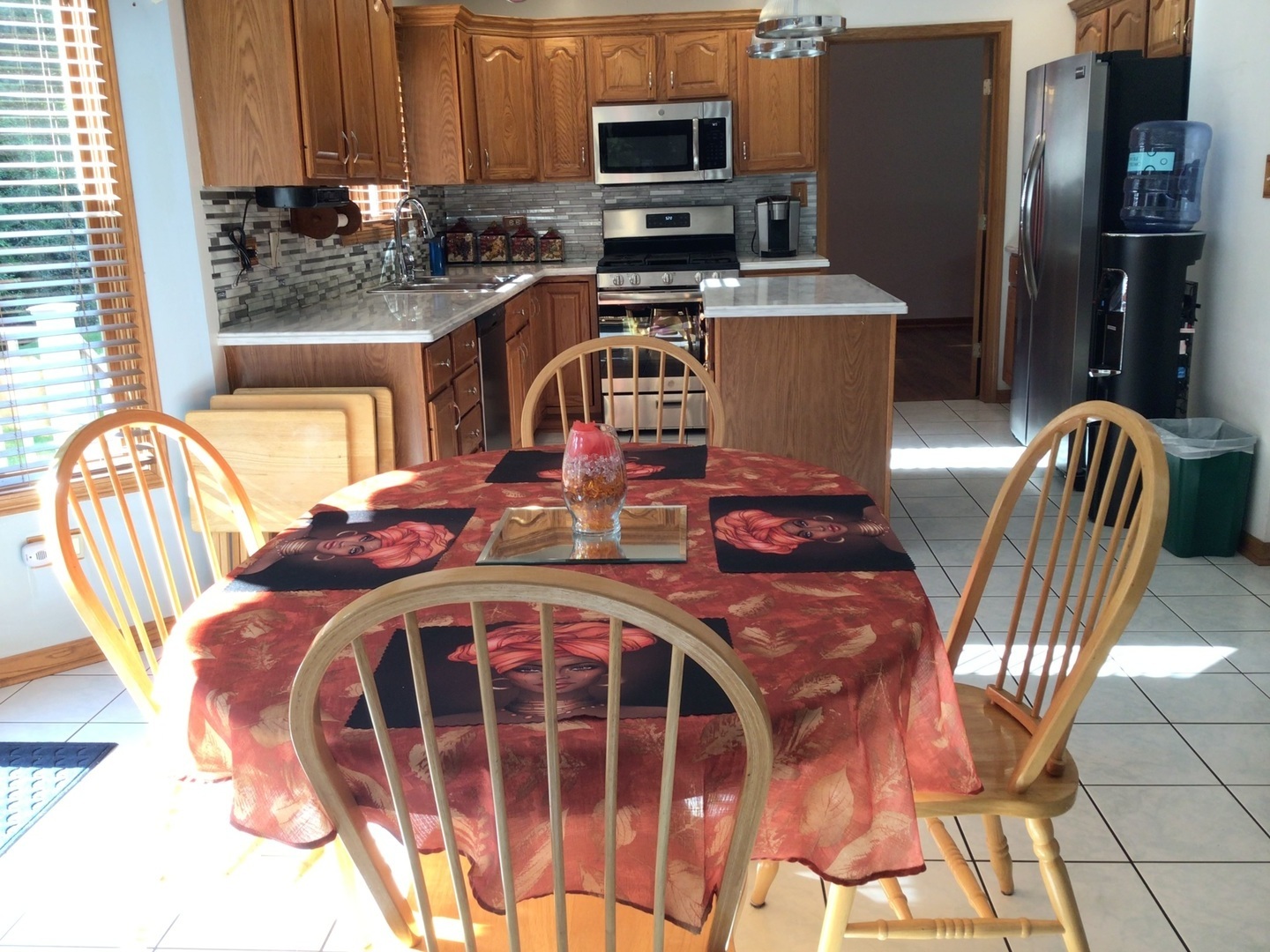 18690 Forest View Lane Lansing, IL 60438 - Photo 11 of 32 a dining room with furniture and a window