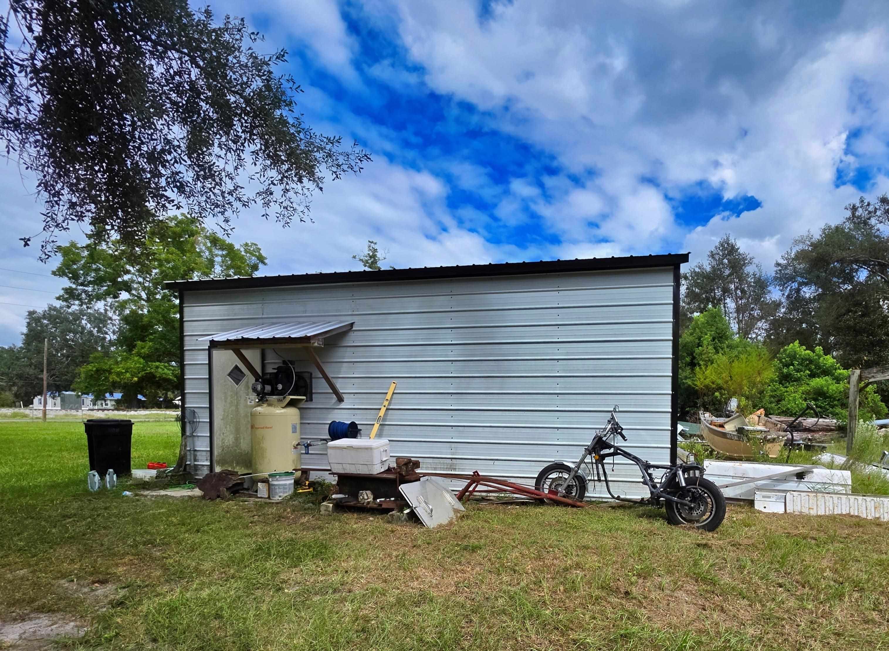 7326 Southeast Farm Road Lee, FL 32059 - Photo 6 of 24