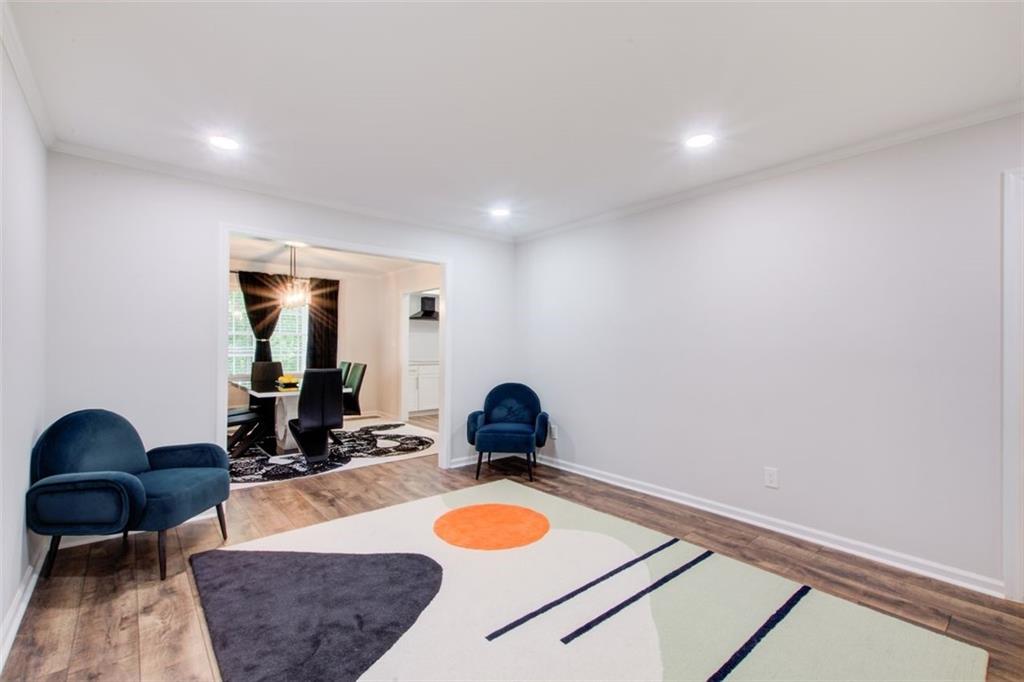 2085 High Point Trail Southwest Atlanta, GA 30331 - Photo 11 of 36 a room with furniture and wooden floor
