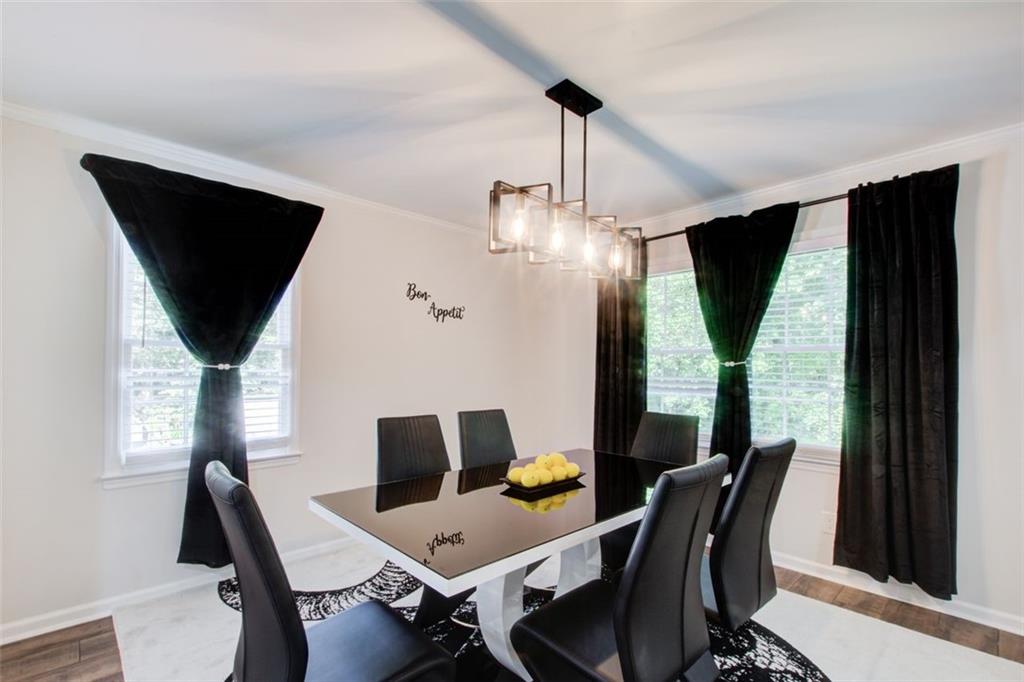 2085 High Point Trail Southwest Atlanta, GA 30331 - Photo 12 of 36 a view of a dining room with furniture window and outside view