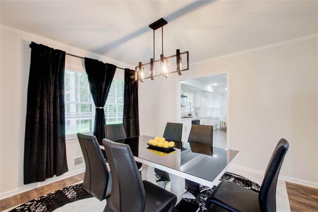 2085 High Point Trail Southwest Atlanta, GA 30331 - Photo 13 of 36 a view of a dining room with furniture and window