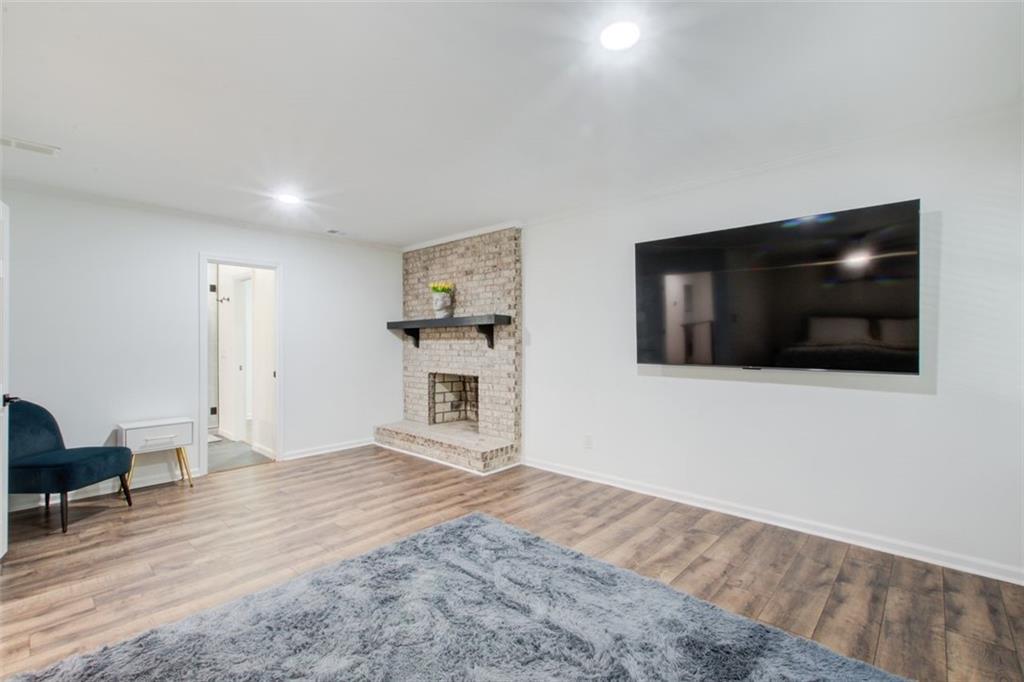 2085 High Point Trail Southwest Atlanta, GA 30331 - Photo 27 of 36 a living room with furniture and a flat screen tv