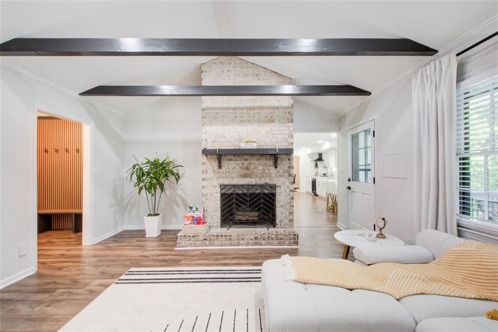 2085 High Point Trail Southwest Atlanta, GA 30331 - Photo 6 of 36 a living room with furniture and a fireplace