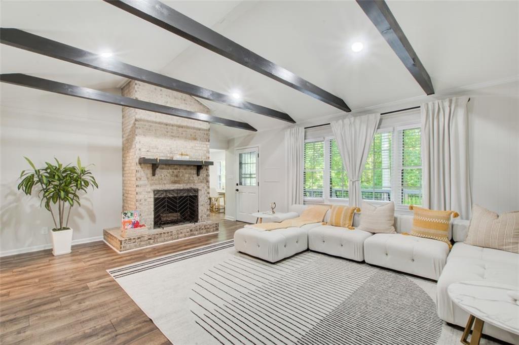 2085 High Point Trail Southwest Atlanta, GA 30331 - Photo 7 of 36 a spacious bedroom with a large bed and a fireplace