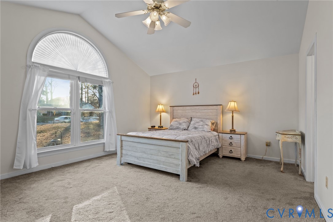 518 Rebel Ridge Road Colonial Heights, VA 23834 - Photo 30 of 44 a spacious bedroom with a bed and a large window