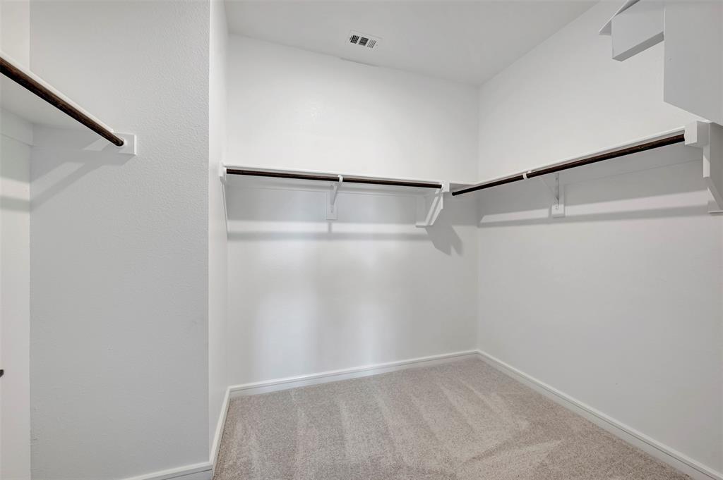 524 Brookside Drive Van Alstyne, TX 75495 - Photo 21 of 32 a view of an empty walk in closet