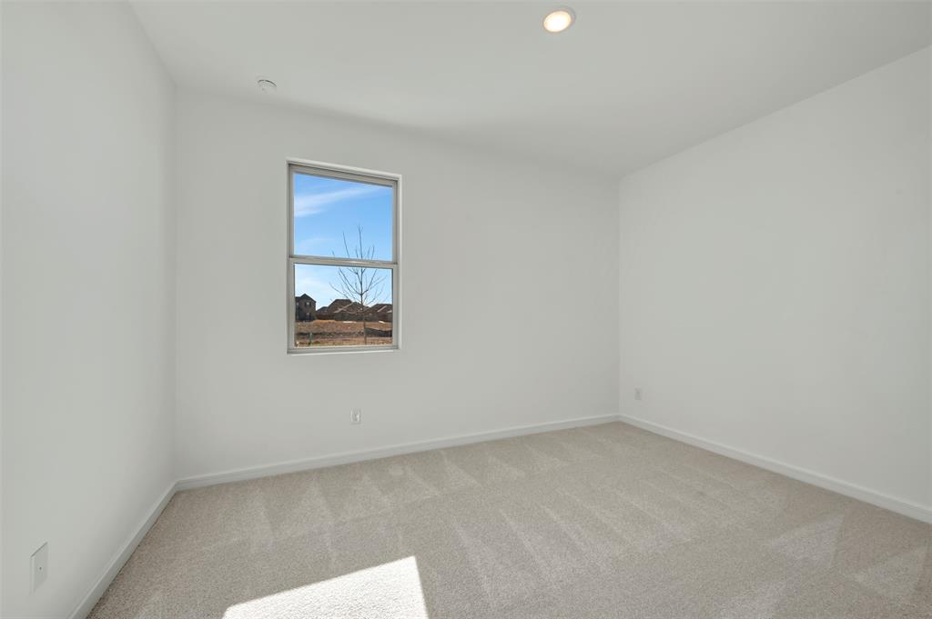 524 Brookside Drive Van Alstyne, TX 75495 - Photo 23 of 32 an empty room with a window