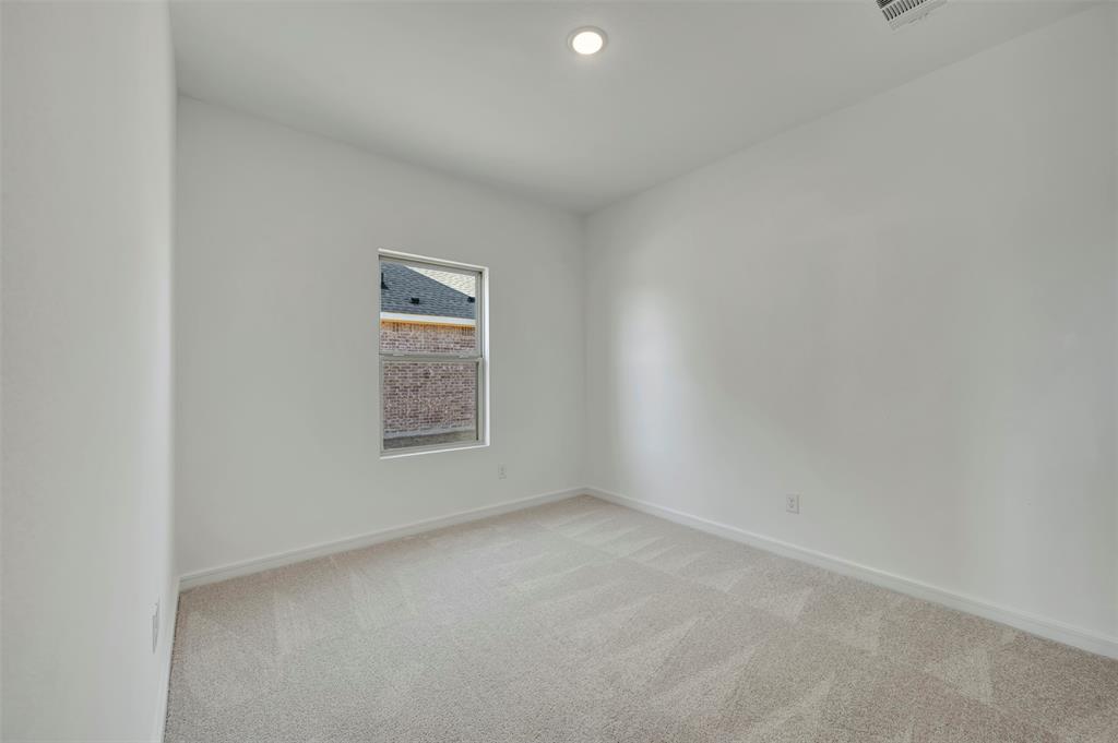 524 Brookside Drive Van Alstyne, TX 75495 - Photo 24 of 32 a view of an empty room with a window