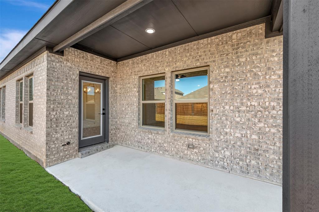 524 Brookside Drive Van Alstyne, TX 75495 - Photo 28 of 32 a front view of a house with a yard