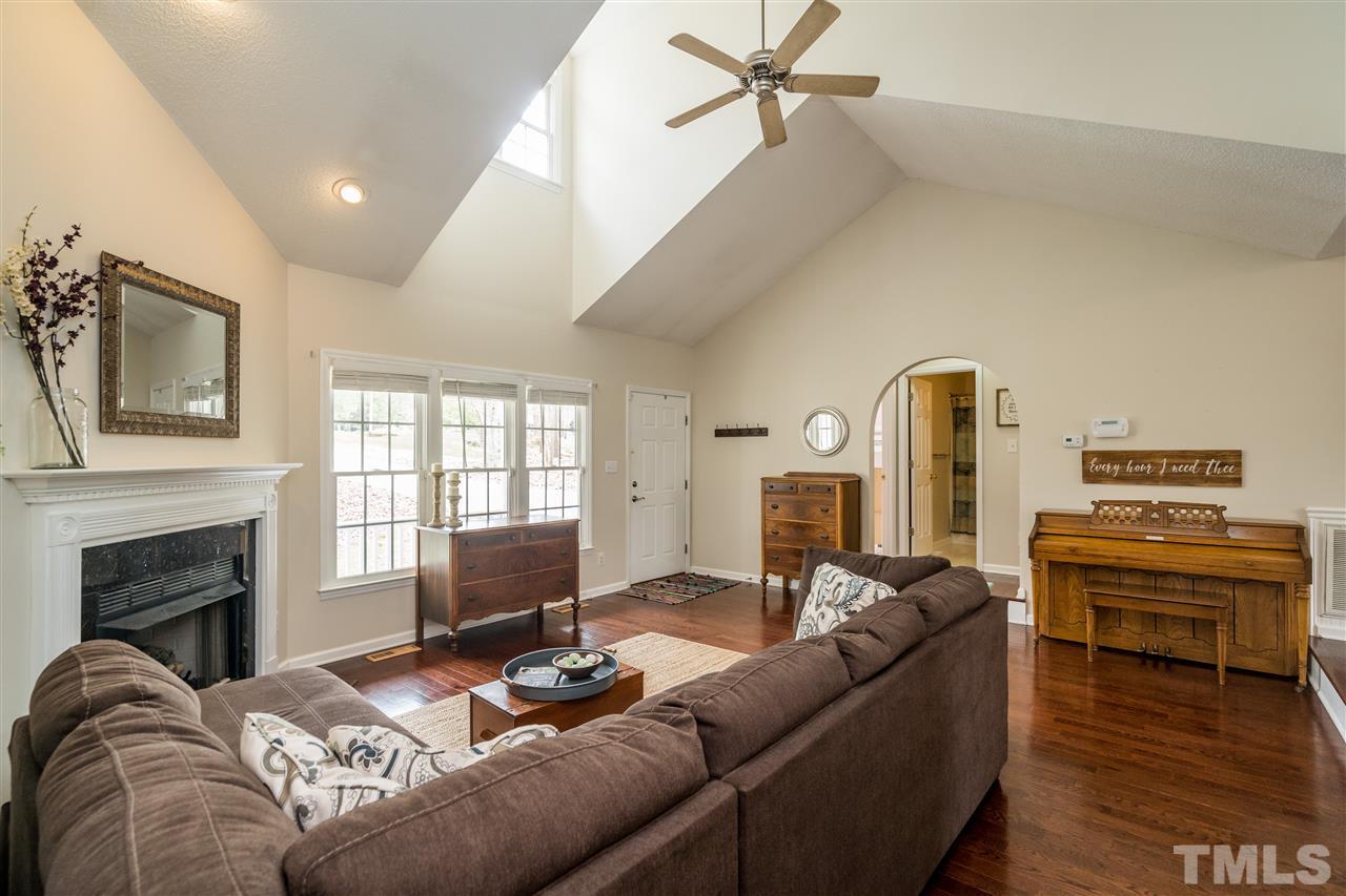 1000 Highlander Drive Raleigh, NC 27603 - Photo 5 of 28 a living room with furniture fireplace and window