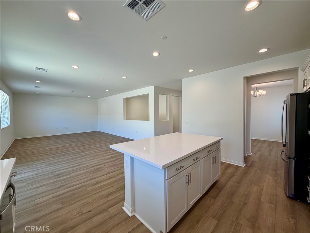 21624 Thomas Court Riverside, CA 92507 - Photo 7 of 36 a kitchen with a sink and a refrigerator
