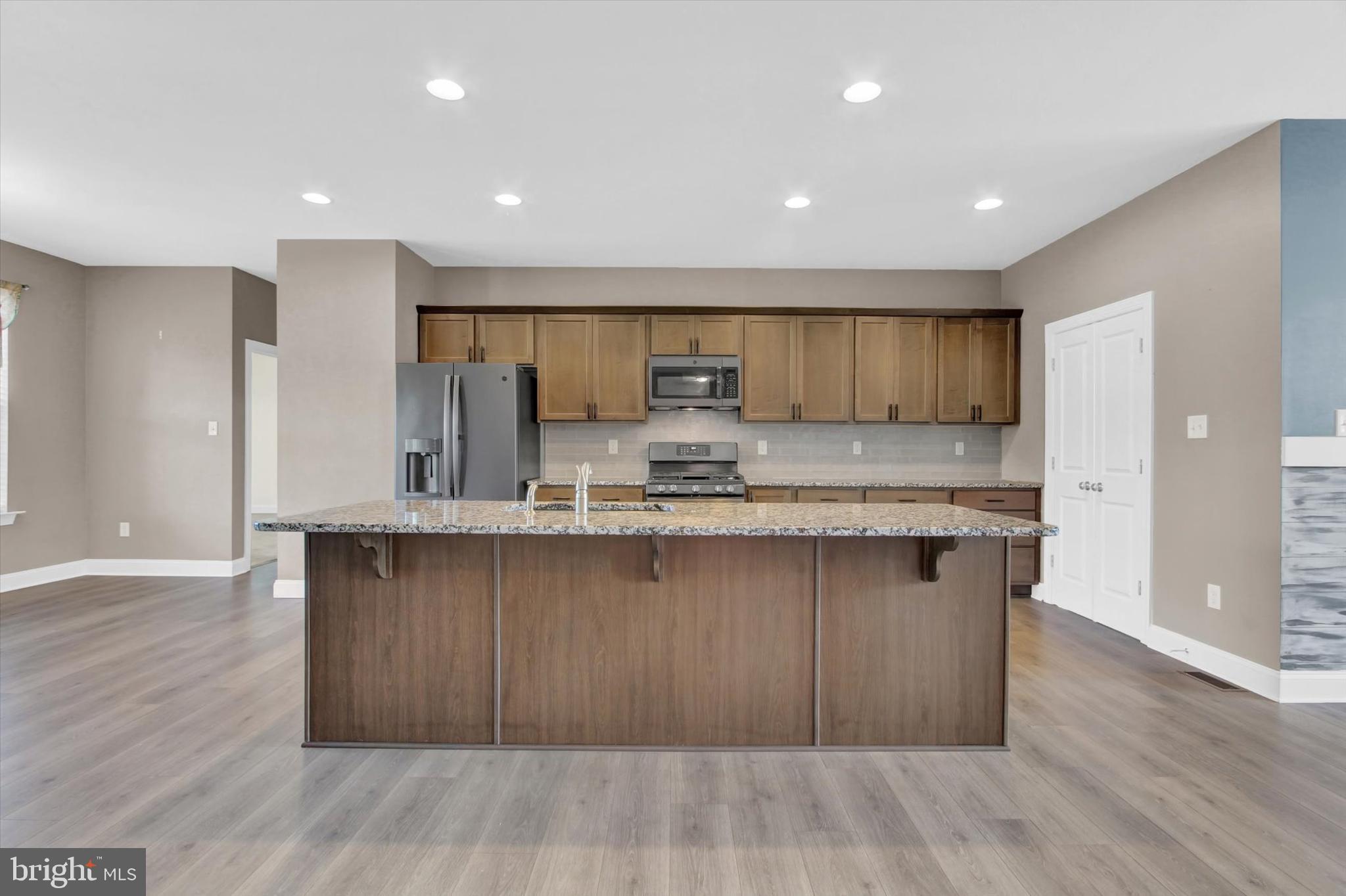1015 Beck Mill Road Hanover, PA 17331 - Photo 11 of 34 Kitchen island open to living/family room