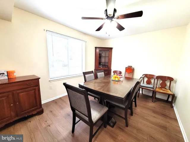 a kitchen with stainless steel appliances a stove a sink and a refrigerator