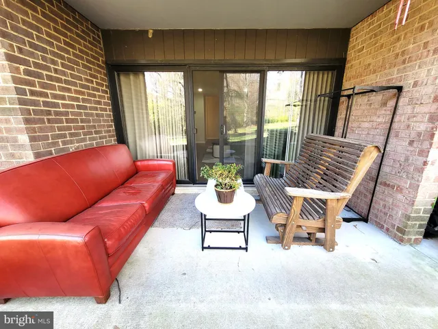 a view of a bench in the patio