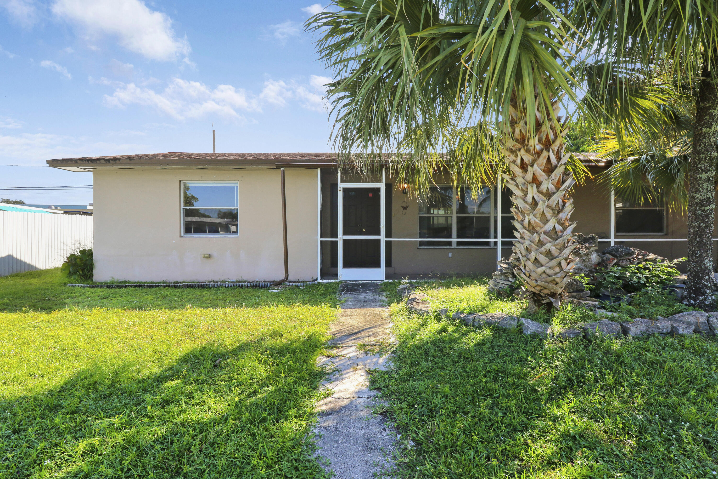 325 Masters Road Palm Springs, FL 33461 - Photo 1 of 35 Front Exterior