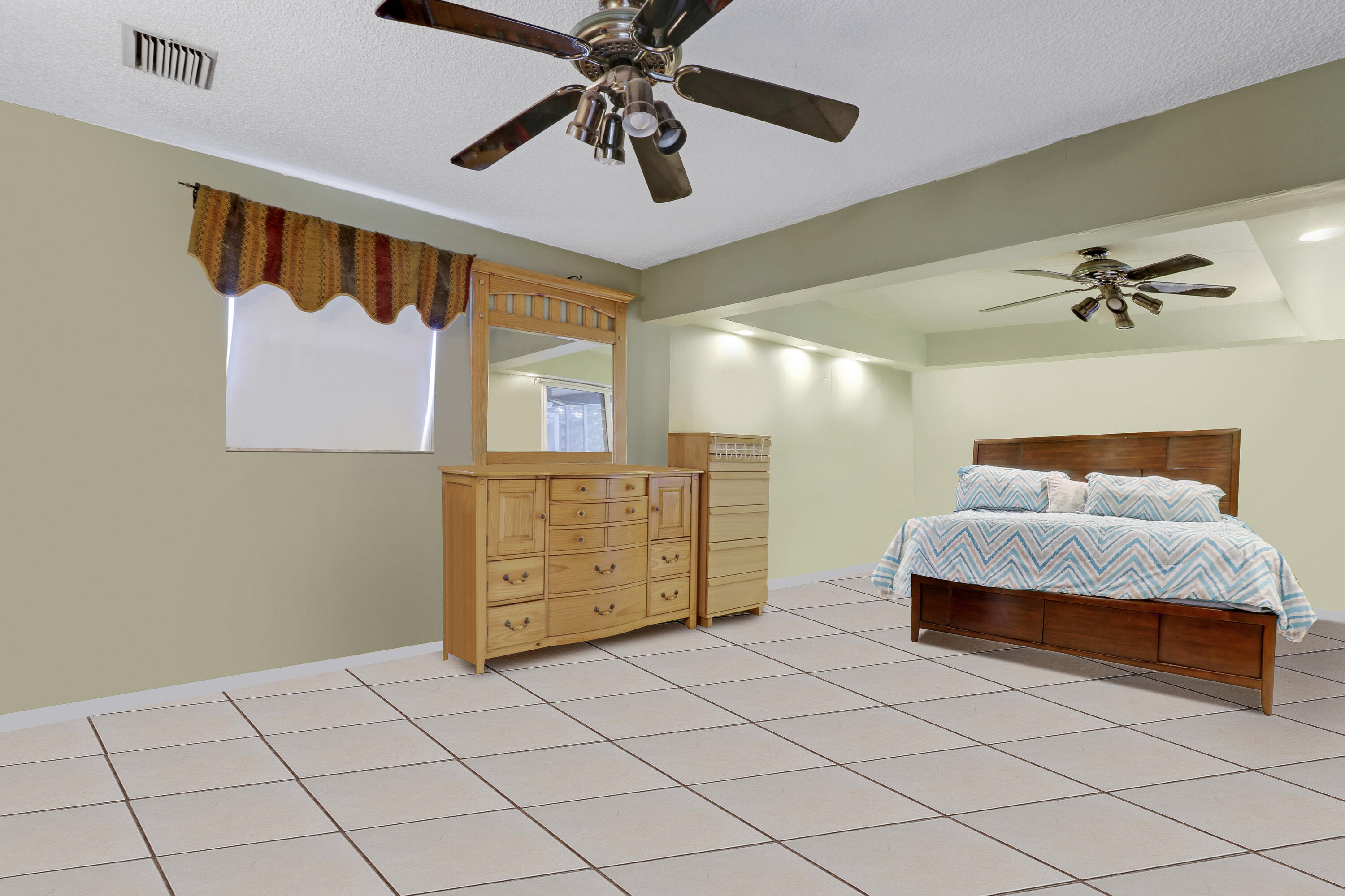 325 Masters Road Palm Springs, FL 33461 - Photo 13 of 35 Primary Bedroom