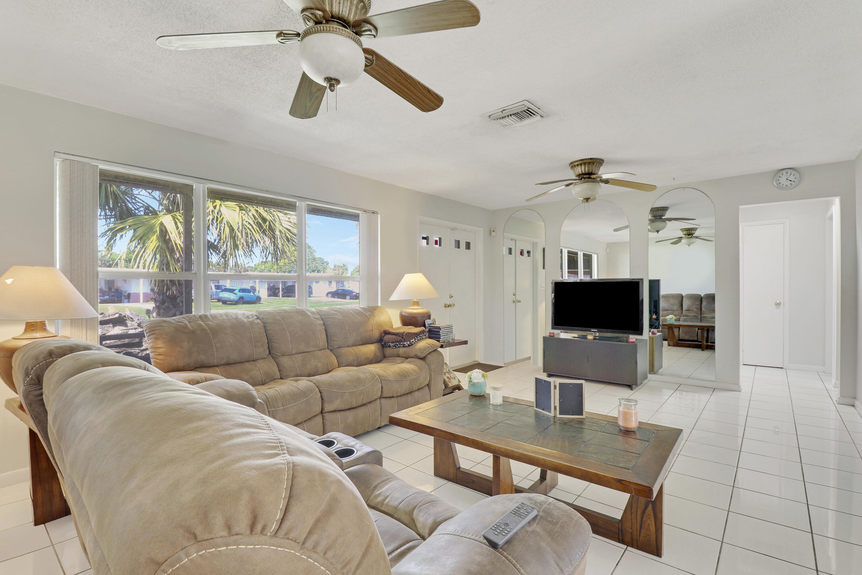 325 Masters Road Palm Springs, FL 33461 - Photo 4 of 35 Living Room